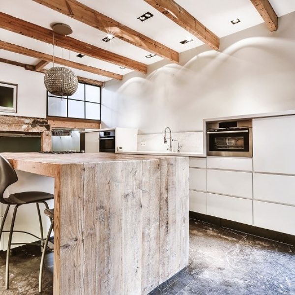 Luxury kitchen with a door leading to the outside